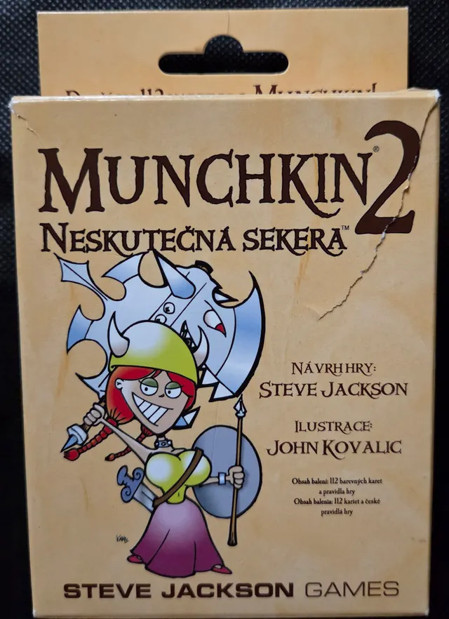 Obal deskové hry Munchkin: Neskutečná sekera (2 rozšíření)